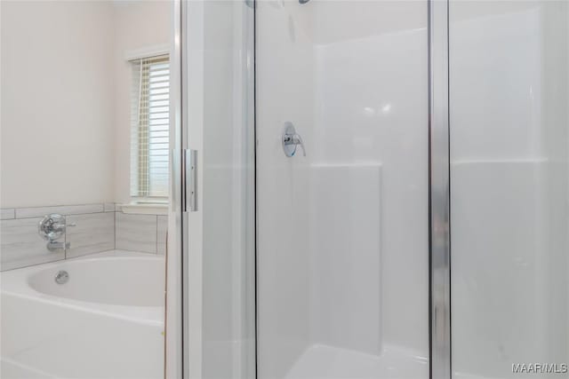 bathroom with independent shower and bath