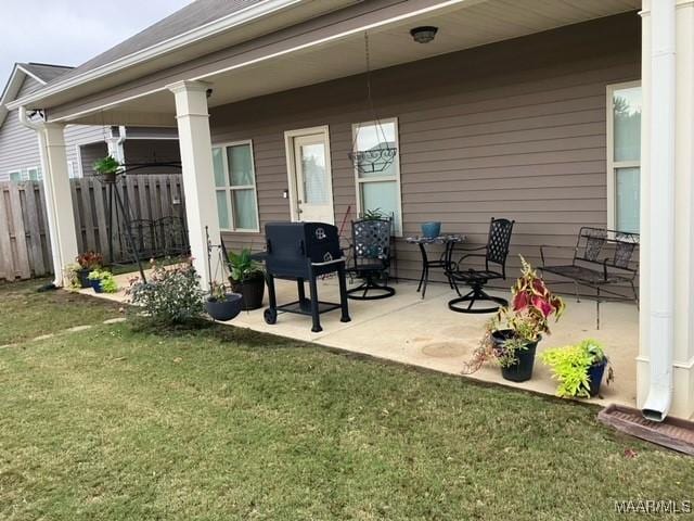 view of patio with fence