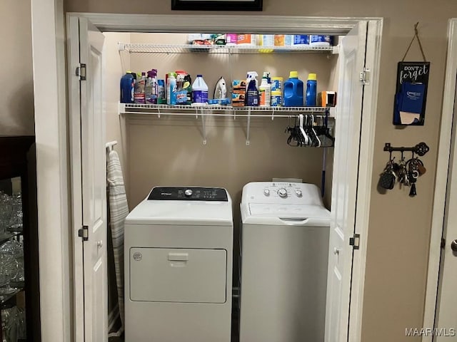 laundry room with laundry area and washing machine and dryer