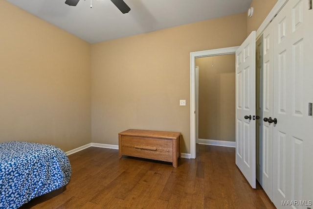 bedroom featuring hardwood / wood-style flooring and ceiling fan