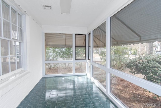 view of unfurnished sunroom