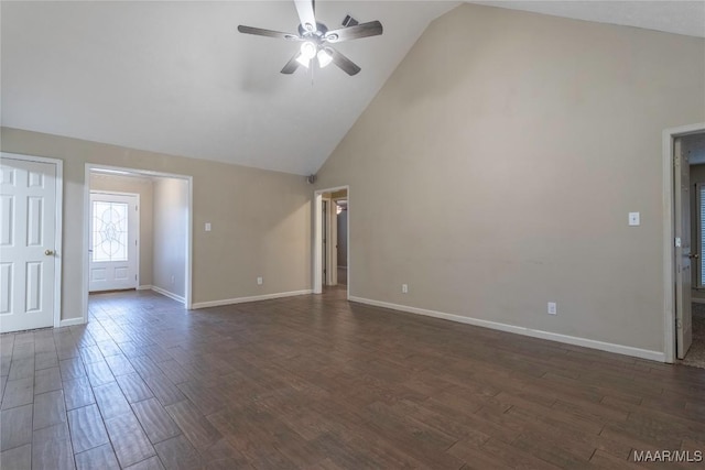 unfurnished living room with high vaulted ceiling, dark wood-style flooring, a ceiling fan, and baseboards