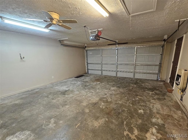 garage with baseboards and a garage door opener