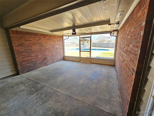 unfurnished sunroom featuring plenty of natural light