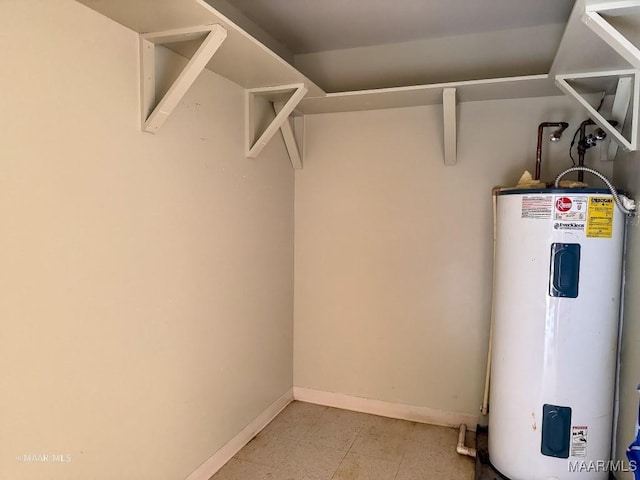 utility room with electric water heater