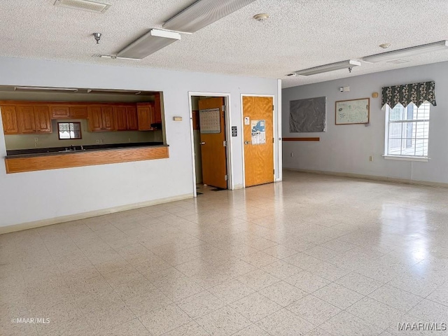 interior space with a textured ceiling