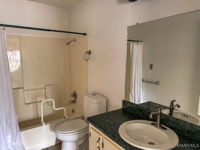 full bathroom with vanity, shower / bath combination with curtain, and toilet