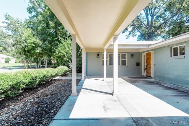 view of patio featuring a carport