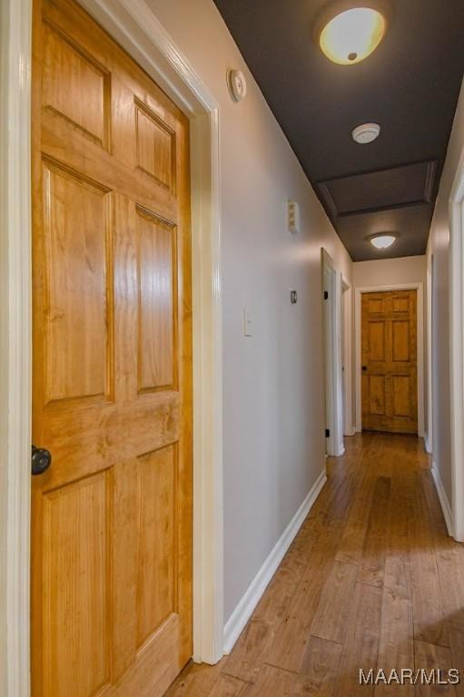 2516 Jasmine Rd, Montgomery, AL 36111 - hall featuring light wood-style floors and baseboards