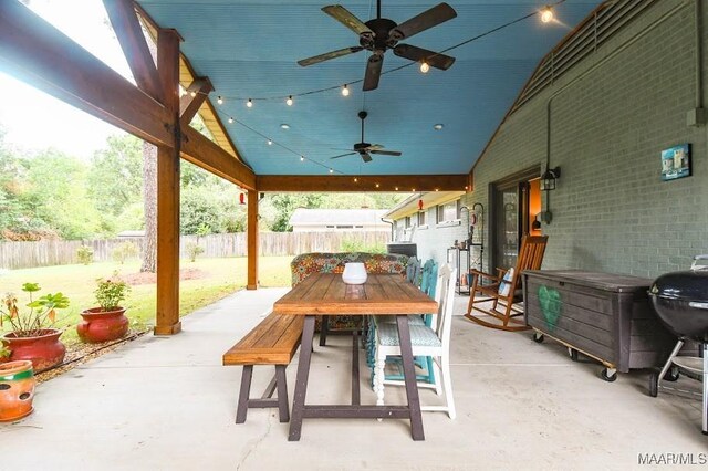 2516 Jasmine Rd, Montgomery, AL 36111 - fenced backyard featuring a patio area, a ceiling fan, and outdoor dining area