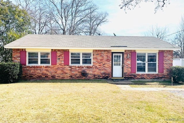 ranch-style home with a front yard