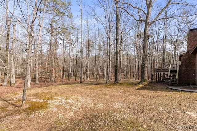 view of yard featuring a deck