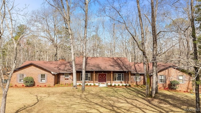 single story home with a front yard