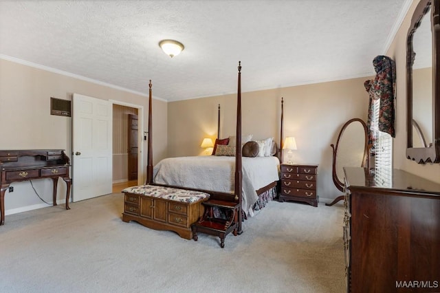 bedroom featuring ornamental molding, light carpet, and a textured ceiling