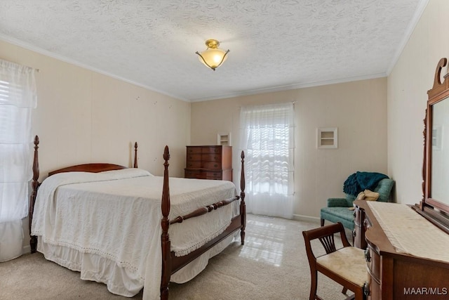 carpeted bedroom with crown molding and a textured ceiling