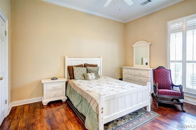 bedroom featuring dark hardwood / wood-style flooring, crown molding, and ceiling fan