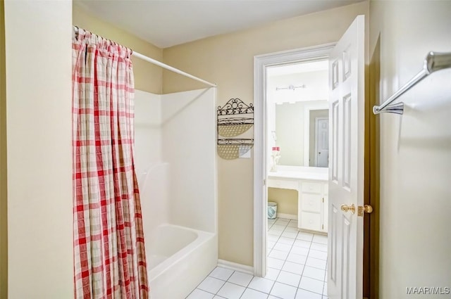 bathroom featuring tile patterned flooring and shower / bath combo