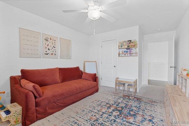 living room featuring ceiling fan