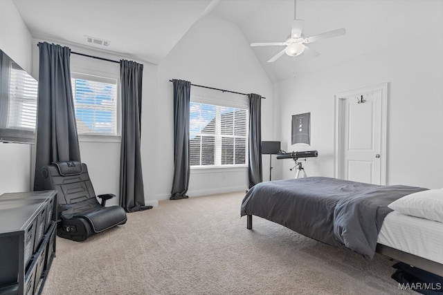 carpeted bedroom with multiple windows, lofted ceiling, and ceiling fan