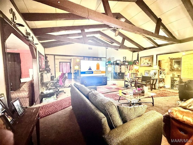 living room featuring vaulted ceiling with beams