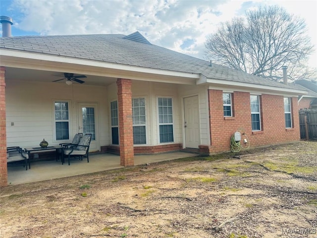 rear view of house with a patio and ceiling fan