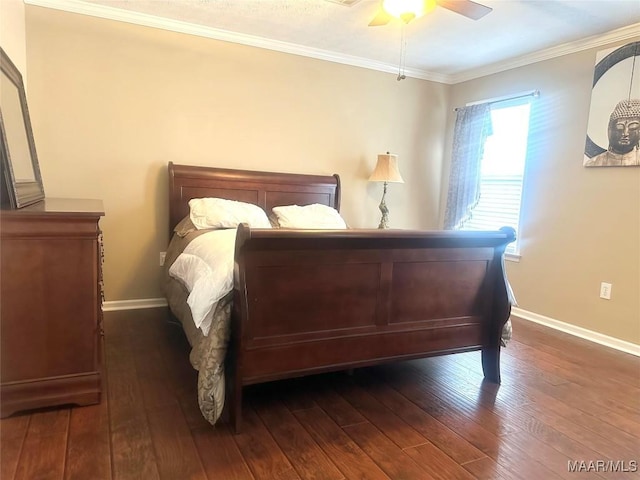 bedroom with crown molding, dark wood-type flooring, and ceiling fan