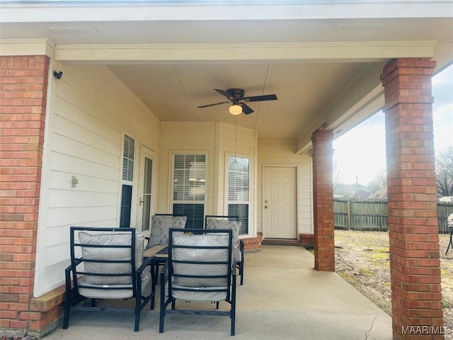 view of patio featuring ceiling fan