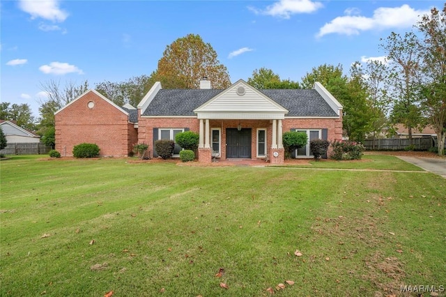 view of front of home featuring a front yard