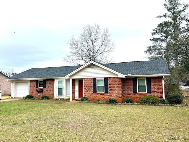 ranch-style house with a garage and a front lawn