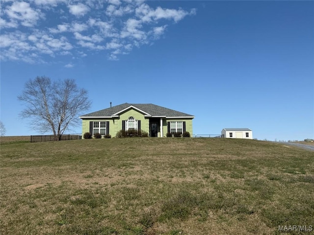 ranch-style house with a front lawn