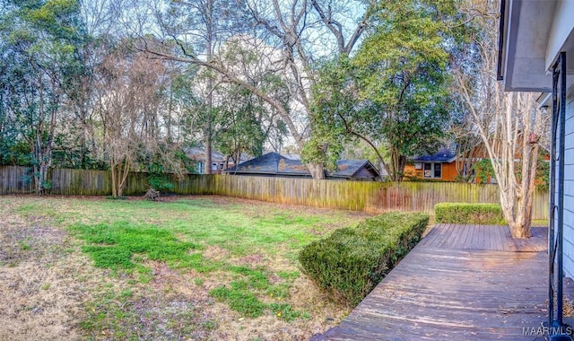 view of yard featuring a wooden deck