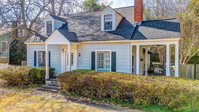 view of new england style home