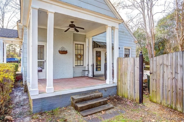 exterior space featuring covered porch and ceiling fan