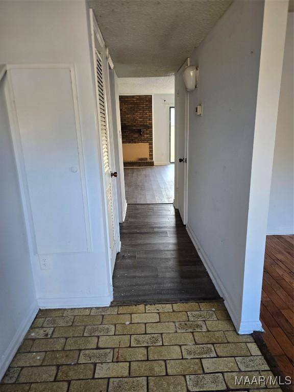 hall featuring dark hardwood / wood-style floors