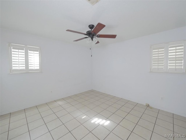 unfurnished room featuring ceiling fan