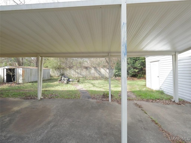 view of patio / terrace featuring a shed