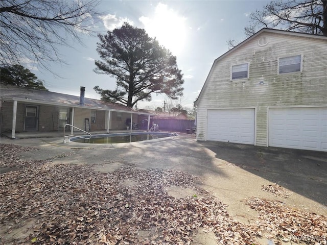 exterior space featuring a garage