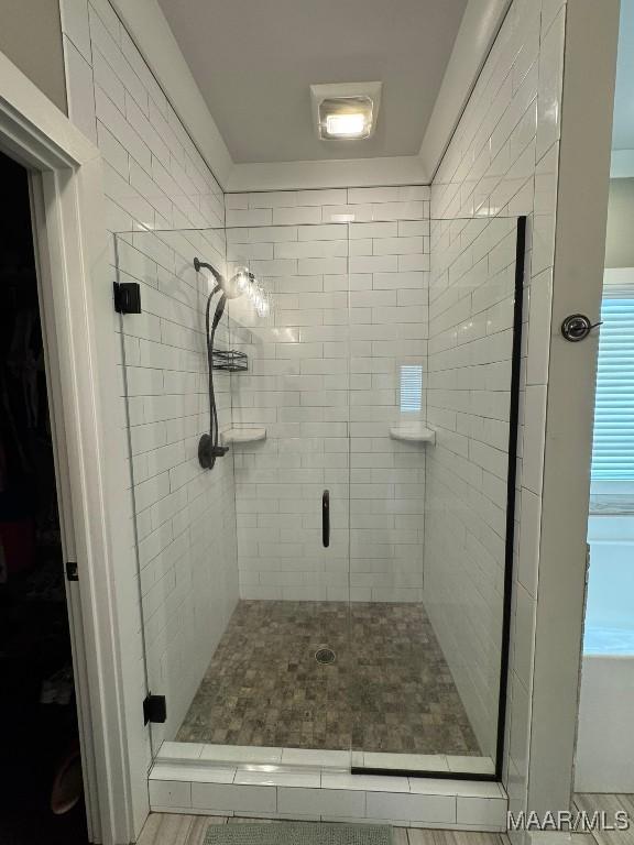 bathroom with an enclosed shower