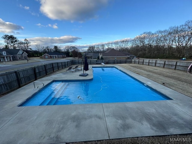 view of pool featuring a patio area