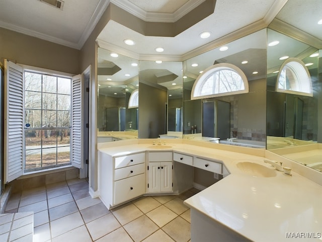 bathroom featuring crown molding, tile patterned floors, vanity, and shower with separate bathtub