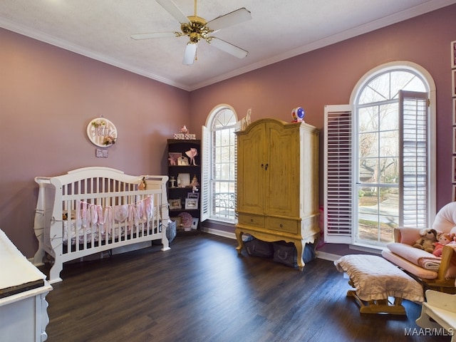 bedroom featuring crown molding, dark hardwood / wood-style floors, and multiple windows