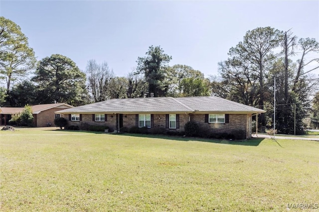 ranch-style home with a front lawn