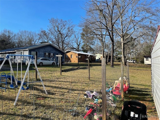 view of yard with a playground