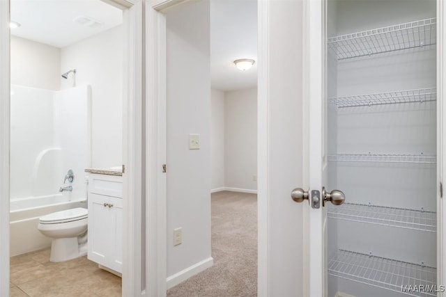 full bathroom featuring vanity, shower / washtub combination, and toilet