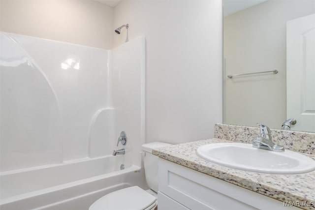 full bathroom with shower / washtub combination, toilet, and vanity