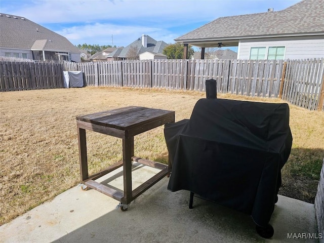 view of patio featuring ceiling fan and area for grilling