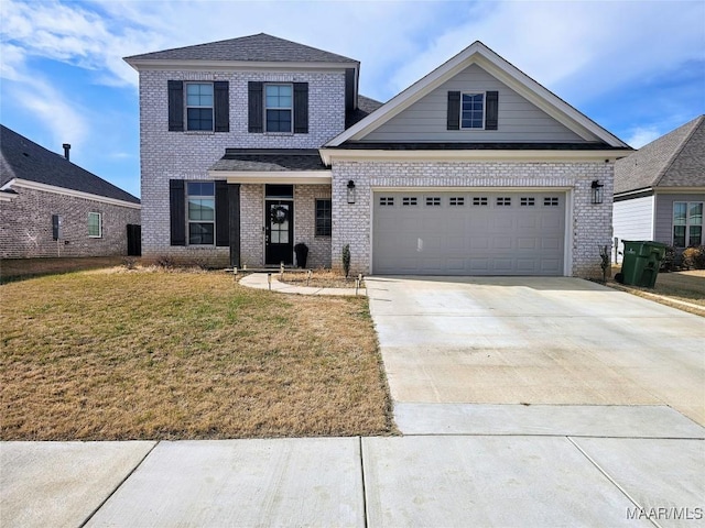 view of front facade with a garage and a front lawn