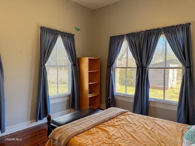 bedroom with wood-type flooring