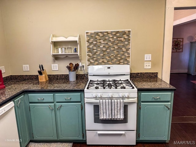 kitchen with white appliances, dark hardwood / wood-style flooring, and backsplash