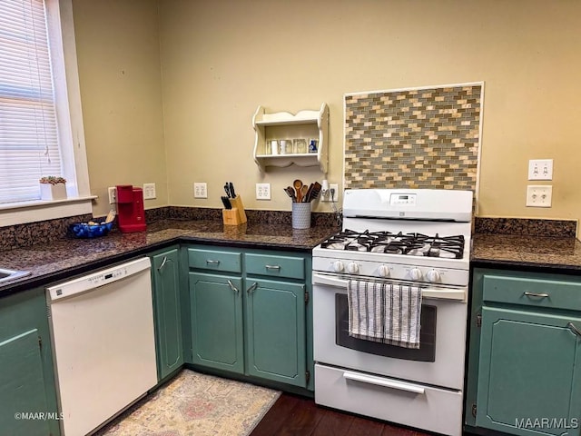 kitchen featuring dark hardwood / wood-style flooring, white appliances, and green cabinetry